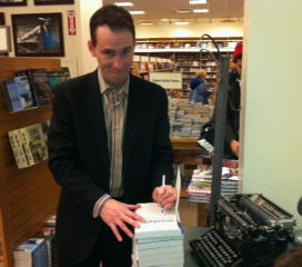 Bruce Sellery signing copies of Moolala